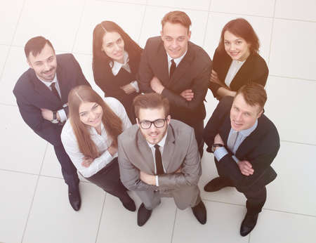 view from the top group of employees looking upの写真素材