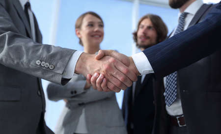 welcome and handshake business peopleの写真素材