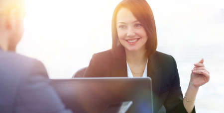 Business people working together at the desk in the officeの写真素材