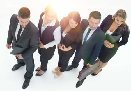 bottom view.confident business team looking at camera.の写真素材