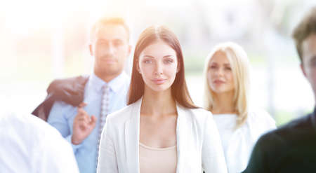 confident business woman among his colleaguesの写真素材