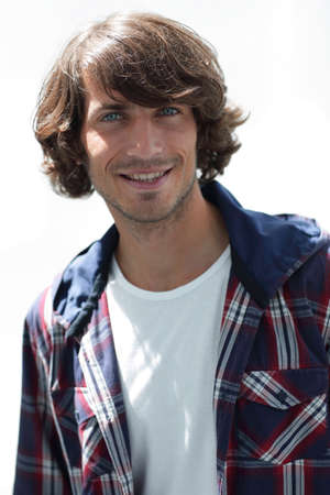 portrait. stylish guy in a plaid shirt. close-up.