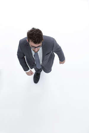 Confident businessman goes forward. view from aboveの写真素材
