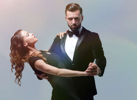 passion dancers over grey backgroundの写真素材