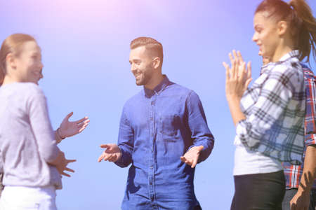 closeup .a team of friends is discussingの写真素材