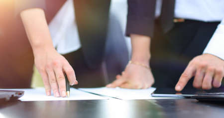 closeup.business people discussing financial documents.の写真素材