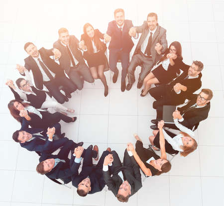 concept of team building .large successful business team sitting in a circleの写真素材