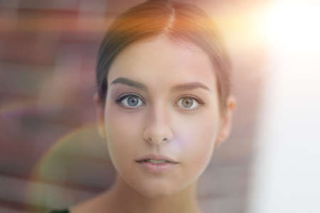 face of young woman with make-up in the style of "business"の写真素材