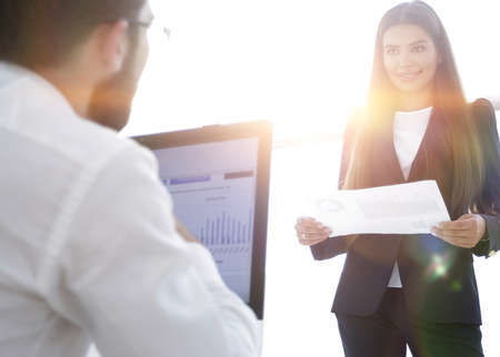 business colleagues discussing documents in the office.の写真素材