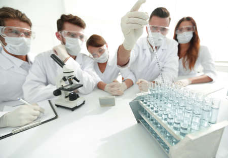 Scientists at chemical laboratory during workの写真素材
