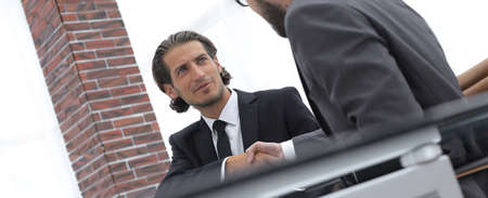 handshake reliable partners in the office.の写真素材