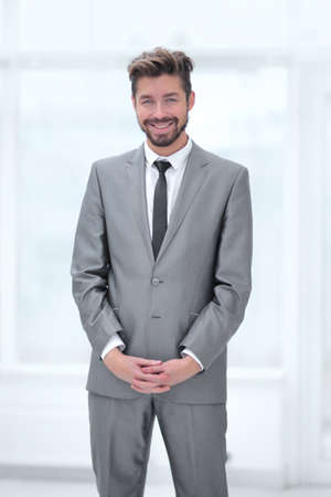 A young man in a gray suitの写真素材