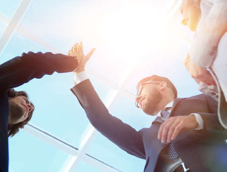 Successful business people handshaking closing a dealの写真素材