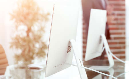 Blurred image of a workplace in the office. business background.