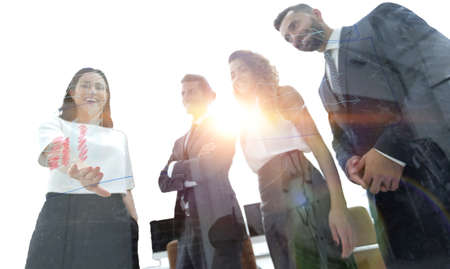 Executive woman talking with her business team