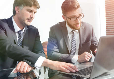 Business colleagues discuss working issues