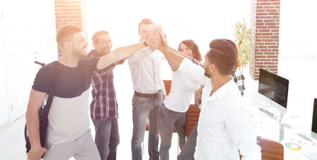 design team giving each other a high five