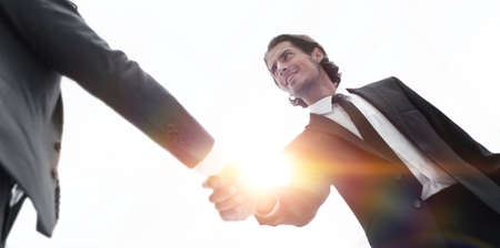 confident business people shaking handsの写真素材