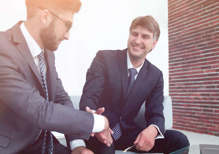 Handshake of colleagues before the meetingの写真素材