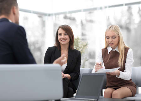 business team discussing business issues in officeの写真素材