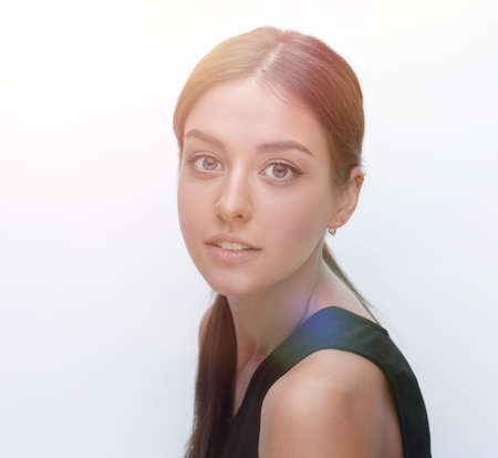 Portrait of a cute young woman. The concept of youth and skin ca