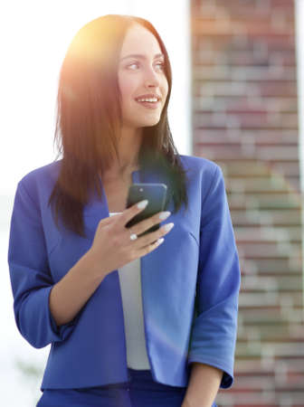 Portrait of a woman using a cell phone