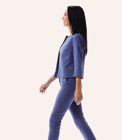 Full body length portrait businesswoman isolated over white studの写真素材