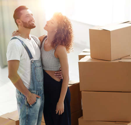 loving young couple standing in a new apartmentの写真素材