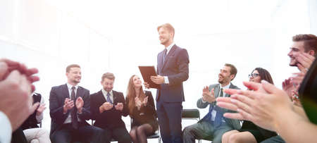 business team applauding the coachの写真素材