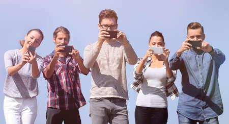 closeup.confident young people make selfies.の写真素材