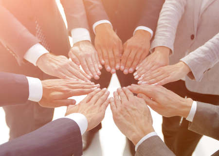 business people giving each other their handsの写真素材