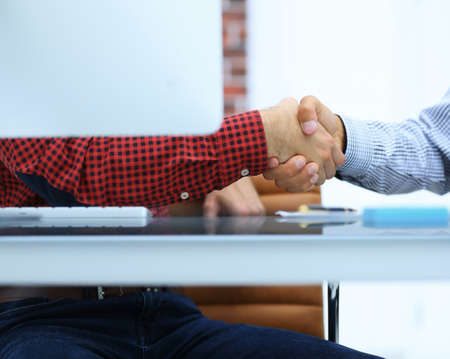 closeup.handshake colleagues