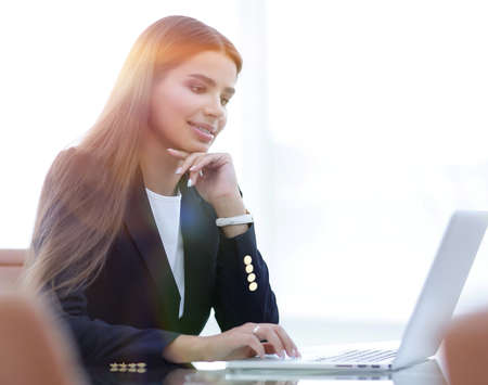 young business woman working on laptop