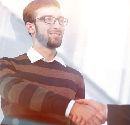 closeup. handshake of the employees of the companyの写真素材