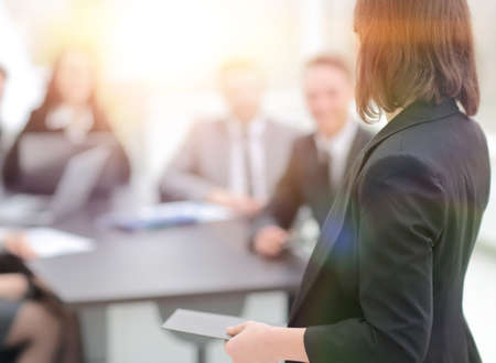 rear view.business woman on blurred background