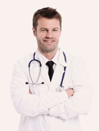 Portrait of confident medical doctor on white backgroundの写真素材