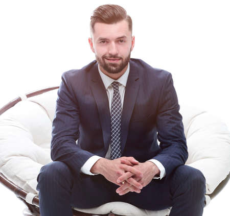 businessman sitting in a comfortable chairの写真素材