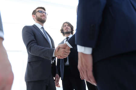 business people handshaking after good deal.