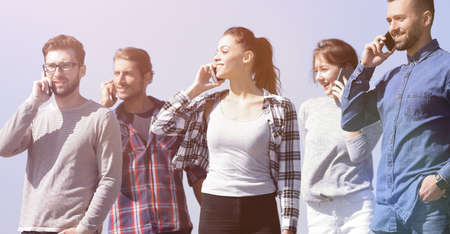 group of young people with smartphonesの写真素材