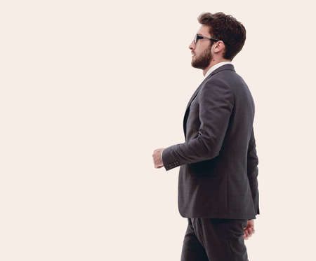 side view confident businessman goes forward.の写真素材