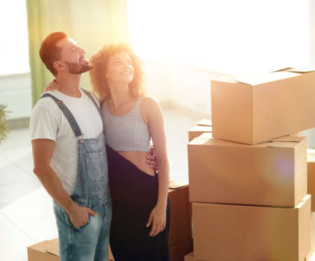 Young happy couple. Moving, buying new housing.