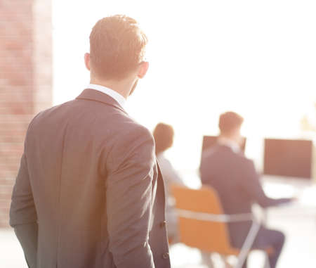 modern businessman standing in office.の写真素材