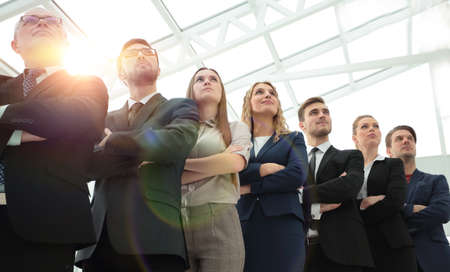 bottom view. successful business team standing togetherの写真素材