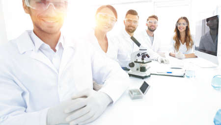 Male scientist and the team in the lab.の写真素材