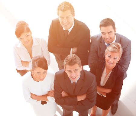 view from the top. successful business team looking at camera.の写真素材