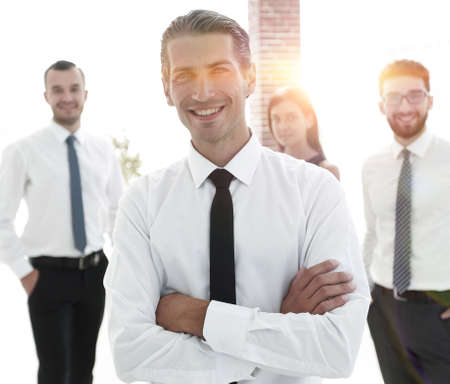 portrait of a successful business person on the background of company