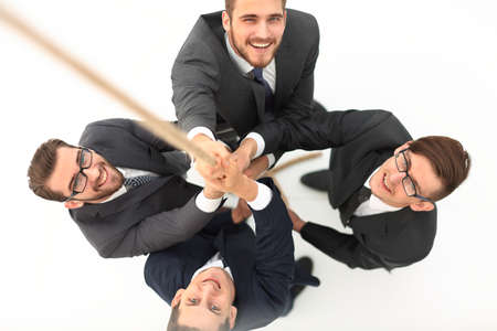 view from the top.business team climbing the rope