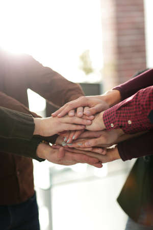 successful business team with hands clasped together.の写真素材