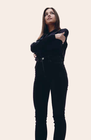 View from below young business woman standing.の写真素材