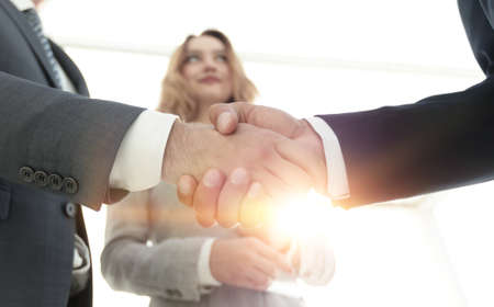 Photo of handshake of two happy businessmenの写真素材